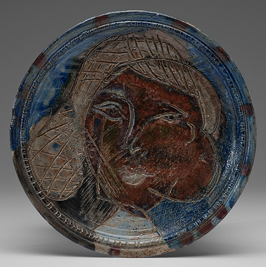 A rare early work by Voulkos, this portrait charger incised with portrait of a woman was made around 1952 at the Archie Bray Foundation in Helena, Montana; the stoneware plate brought $3,000 at Cowan’s in May. Courtesy Cowan’s+Clark+Delvecchio Auctions